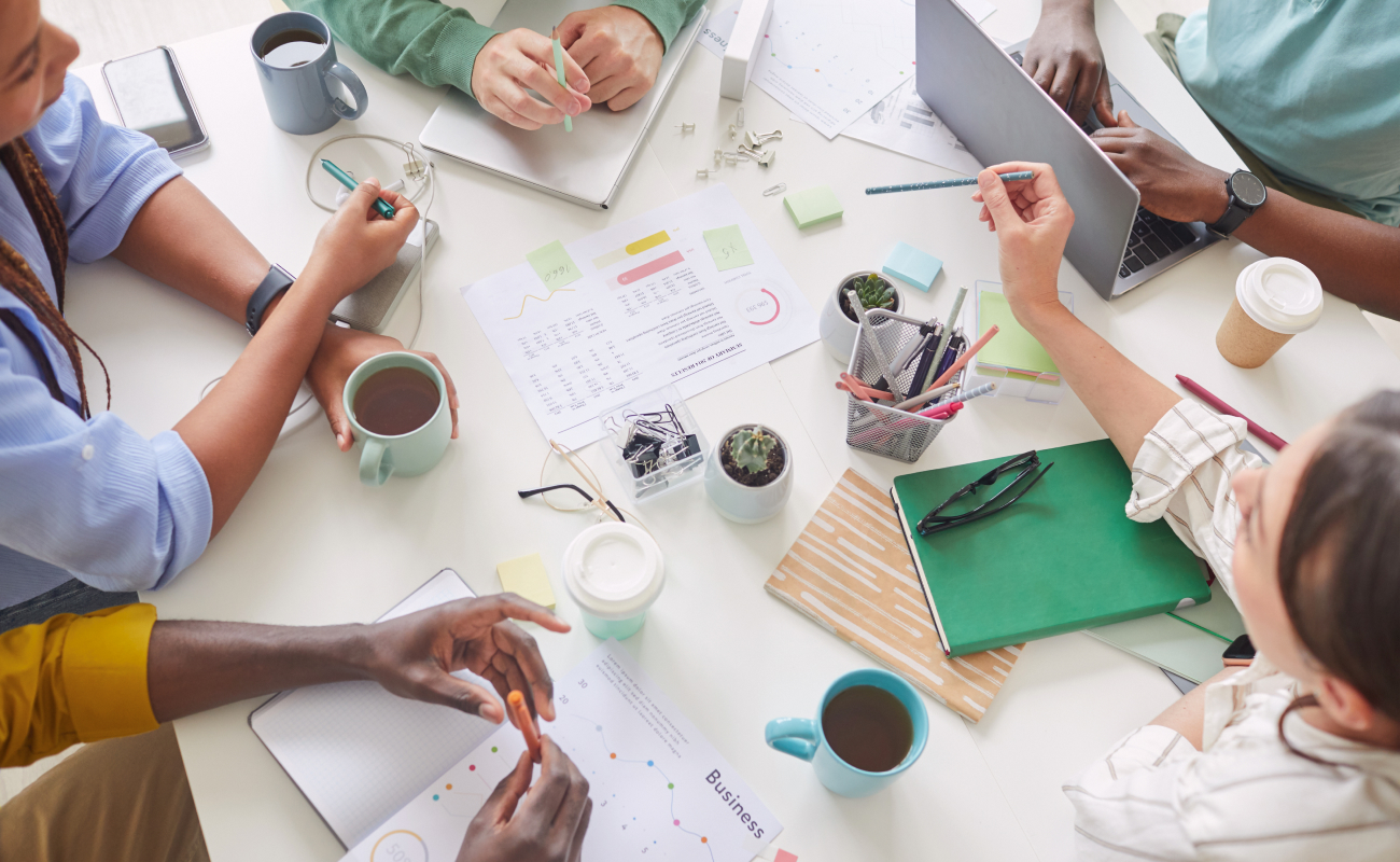 Illustration of a multi-layered funnel surrounded by abstract elements, representing the concept of creative workflows and bottlenecks.