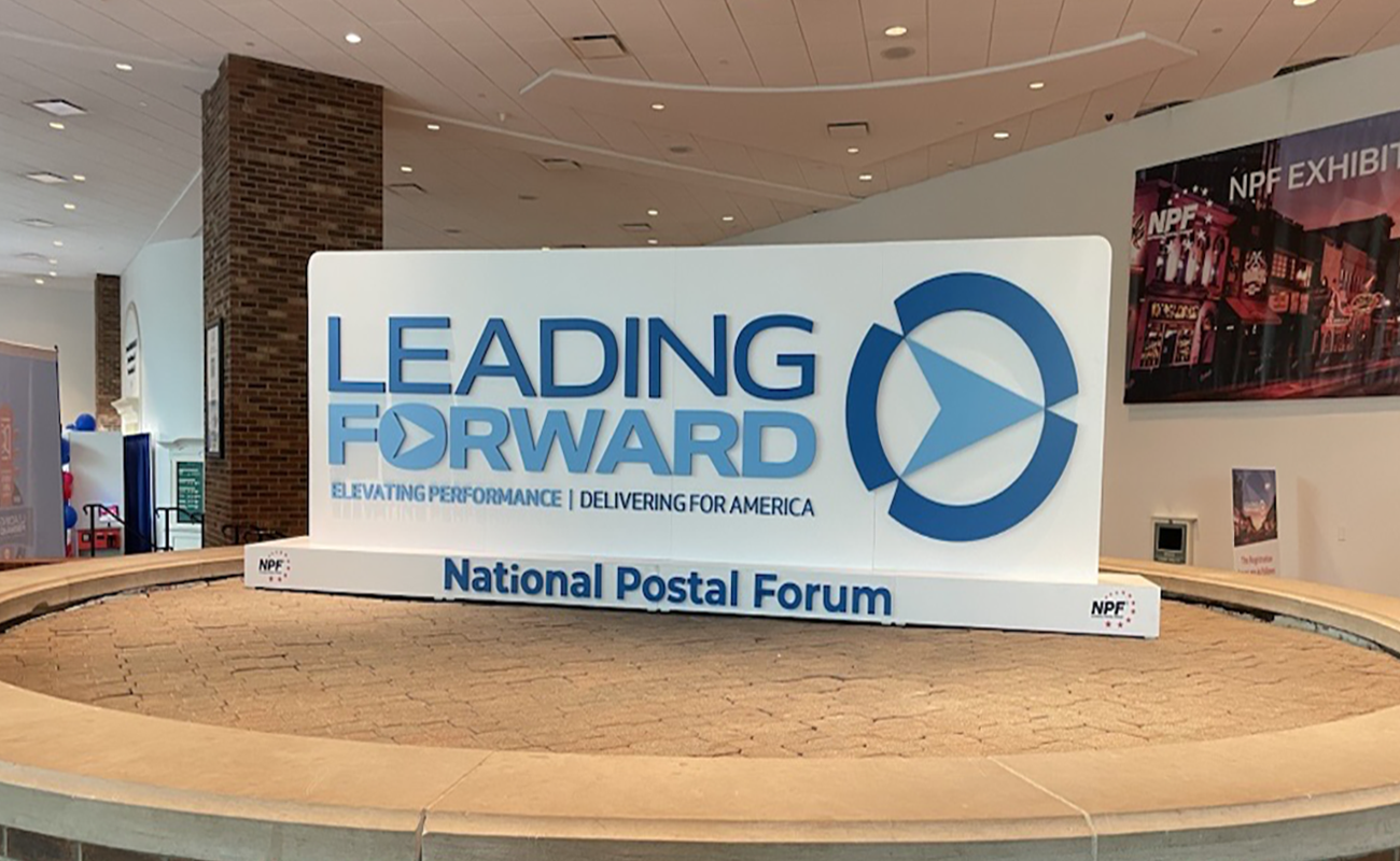 National Postal Forum 2025 - Leading Forward Display at Event Entrance