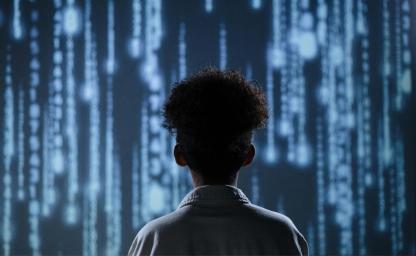 Person Looking at Digital Data Wall – AI Innovation and Creative Technology