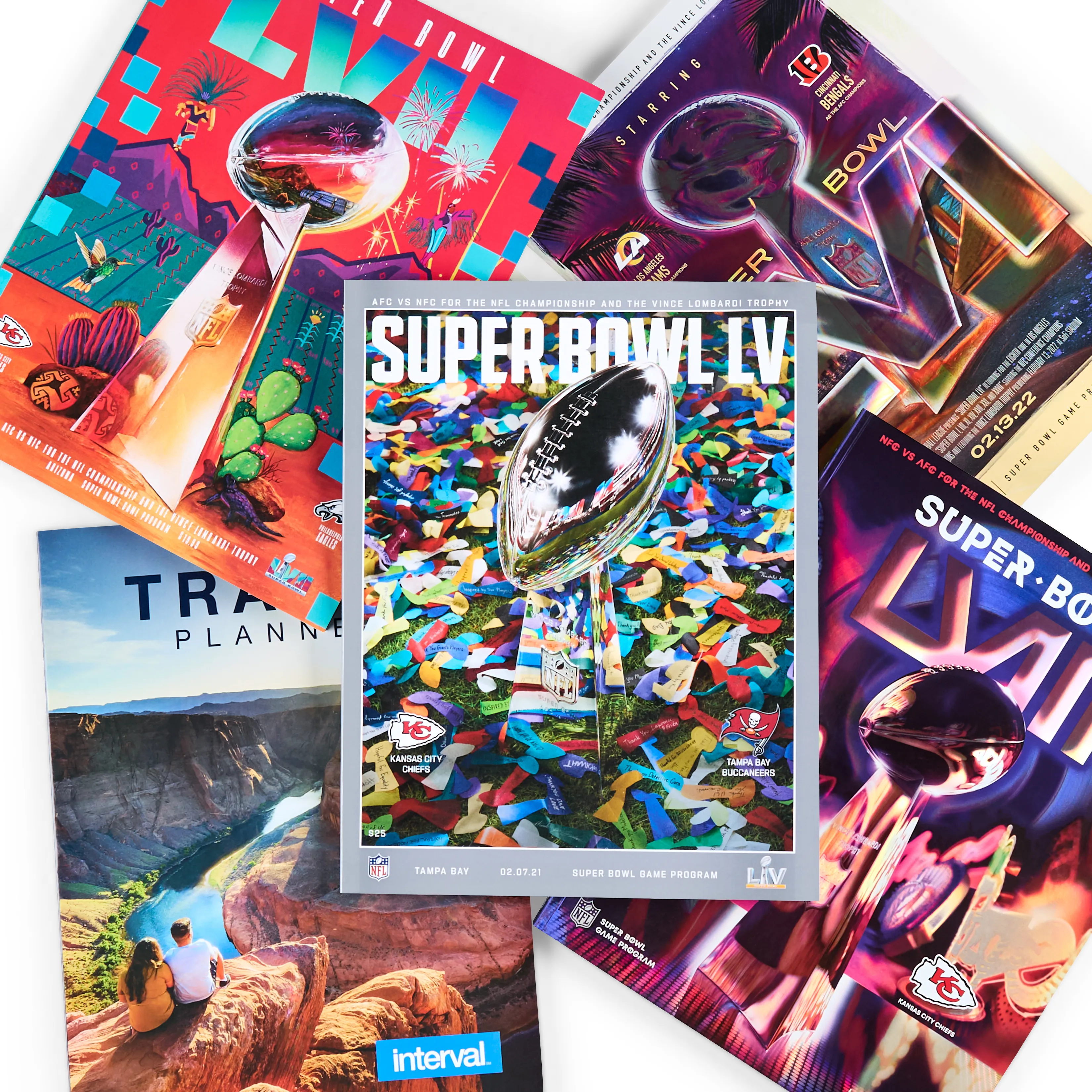 Colorful stack of branded magazines and print publications.
