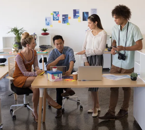 Diverse business colleagues discussing